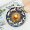 Круглый брелок-подвеска из сплава со стеклом и узором солнца