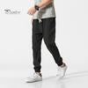 Весна Осень Мужские шаровары Шаровары Свободные завязывающиеся на шнурок эластичные карманы Глубокий шаговый шов с резинкой на щиколотке Однотонные спортивные брюки Повседневная одежда Спортивные брюки