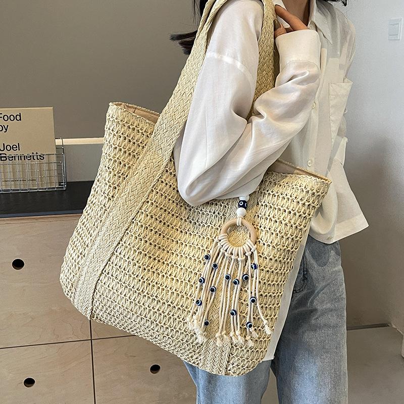 2025 New Straw Plaited Woven Women's Roomy Bag Casual Versatile Single Shoulder Bag High Capacity Seaside Beach Bag Vacation Commuter Large Tote Bag