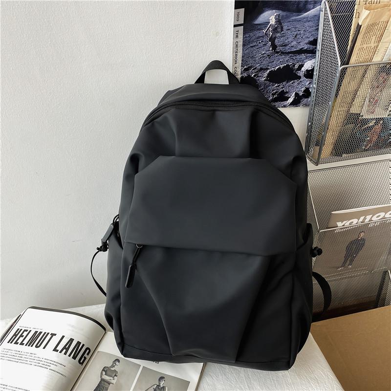 Schoolbag waterproof nylon Korean version backpack large capacity college bag men's pleated leisure travel computer backpack