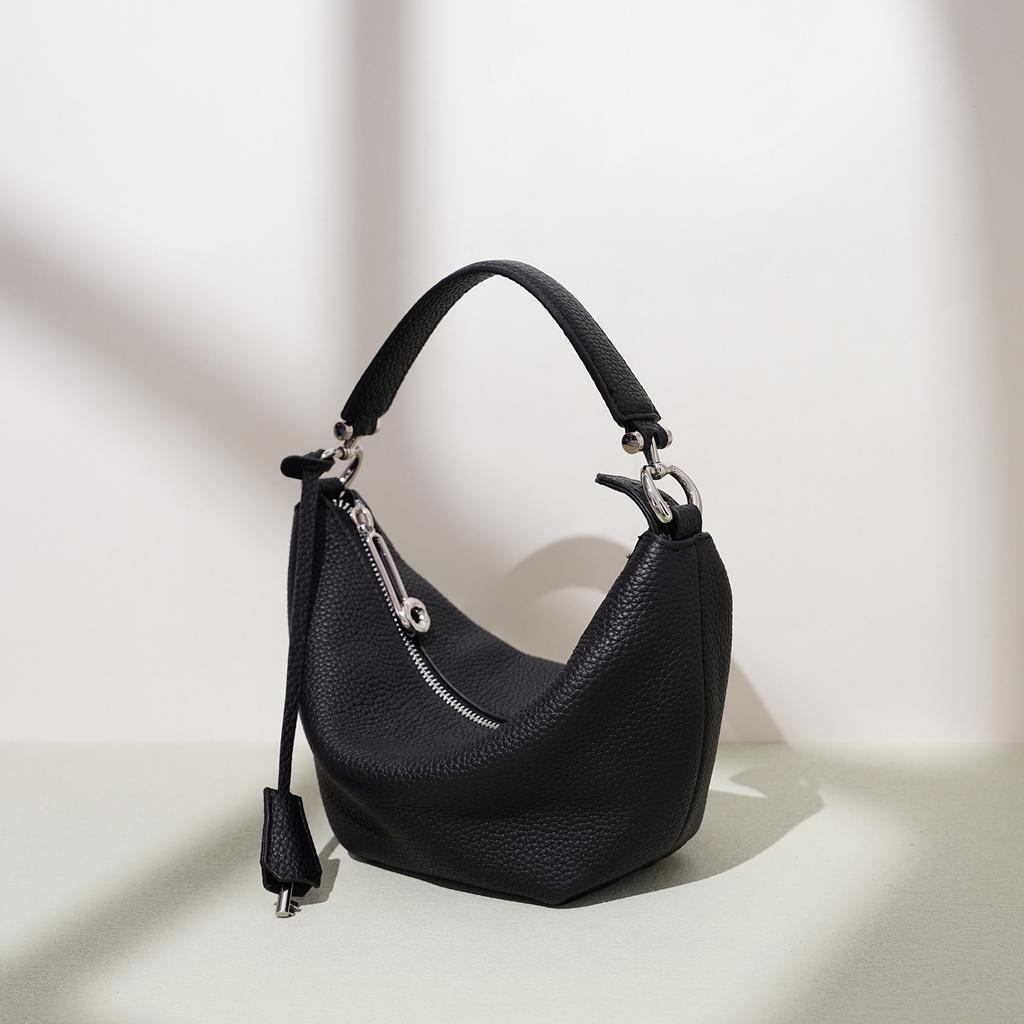 Premium texture hand carry dumpling bag fashionable foreign style leather commuter messenger ingot bag niche design handbag