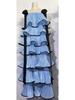 Элегантное sleeveless платье в французском стиле с бантом, многослойной плиссировкой и цветочным контрастом.