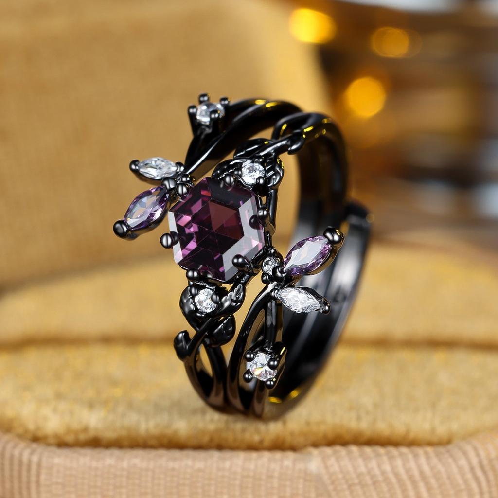 Vintage black and gold hexagonal ring with purple diamonds Forest-inspired branch and leaf design, a touch of understated luxury