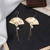 Antique-looking Fan-shaped Earrings with Intricate Floral Carvings and Fringes