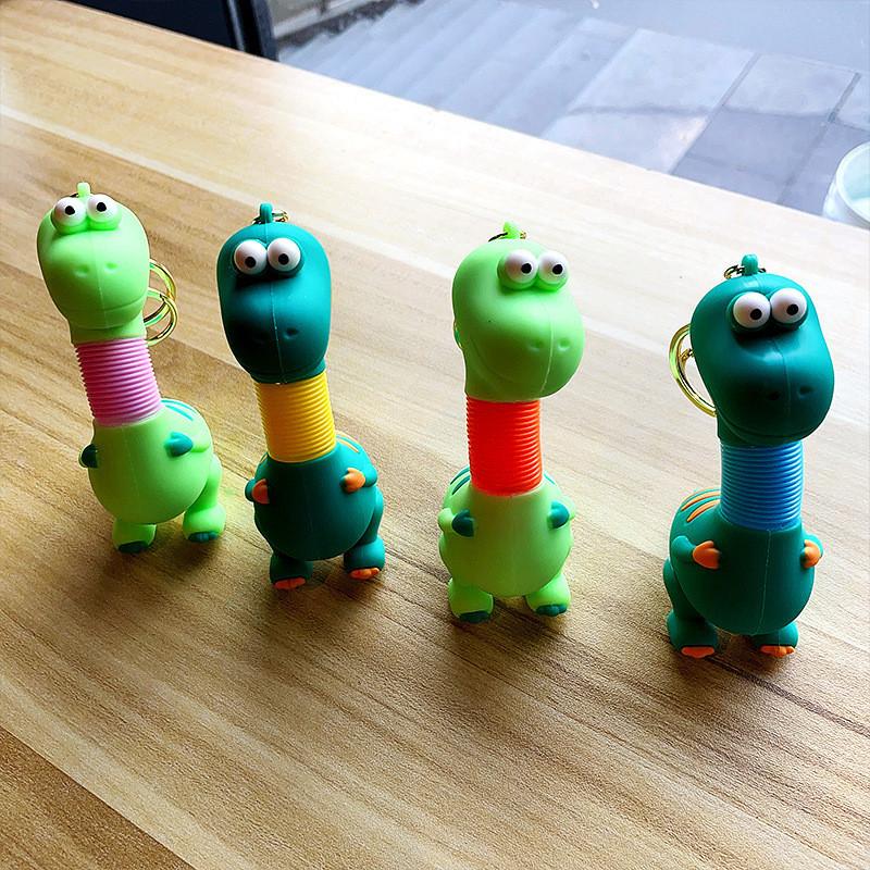 Очаровательный выдвижной брелок-динозавр, милый мультяшный дизайн для детей и взрослых