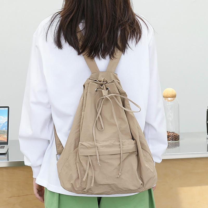 IELGY Korean Version of Casual Literary Canvas Backpack, Fashionable Nylon Solid Color Small Fresh Drawstring Backpack