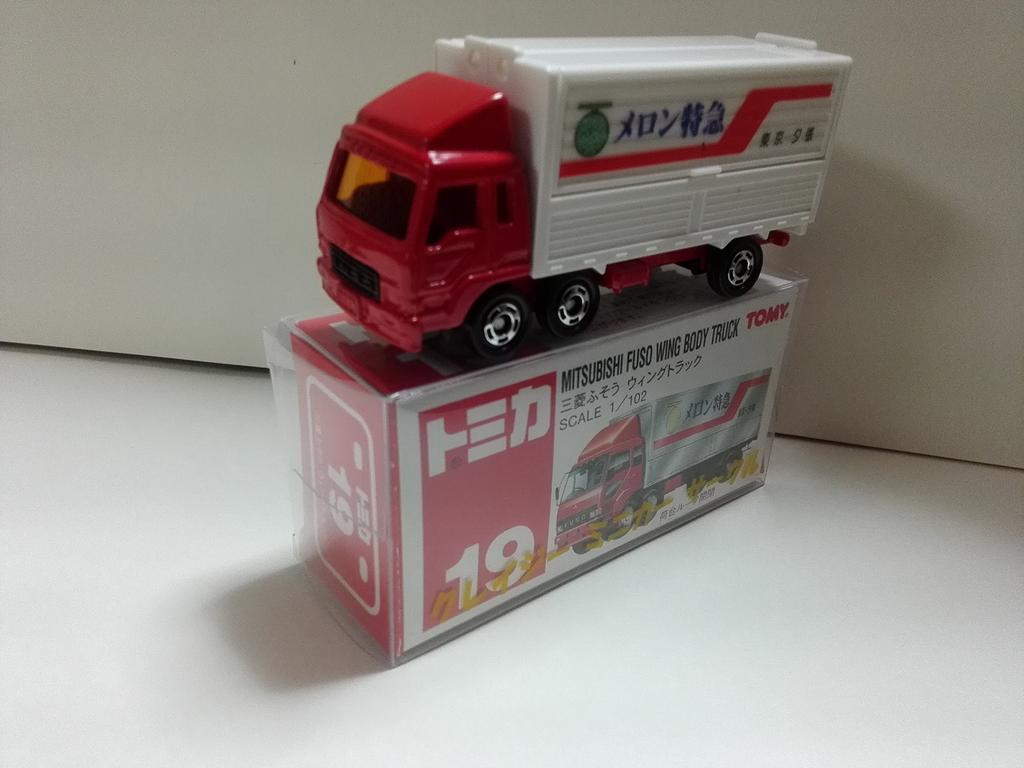 Tomica Red Box 19 Mitsubishi Fuso Melon Express Crazy Mini Car Circle с номером кейса.