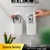 Wall-Mounted Toothbrush and Cosmetics Storage Rack