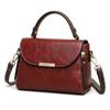 A Fashionable Retro Shoulder Bag with A Niche Design Featuring A Soft Leather Texture Contrasting Colors In A Small Square Bag