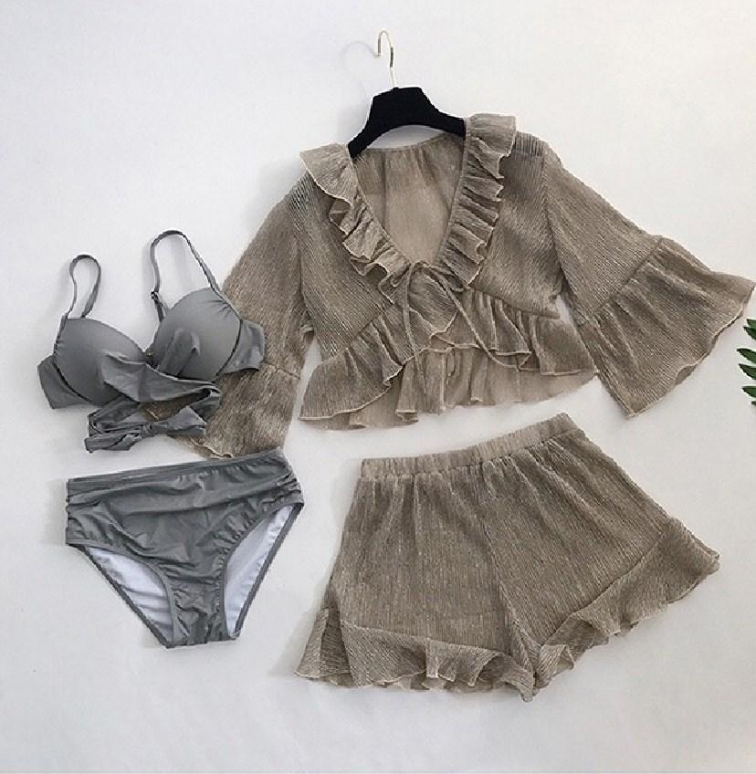 The new Korean split small fragrant four-piece seaside vacation sexy bikini swimsuit smock covers the belly and looks thin