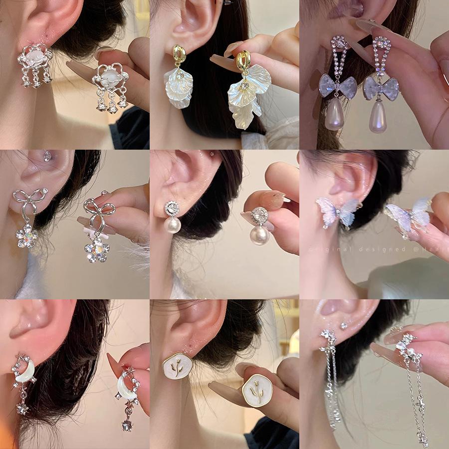 Серьги-бабочки с цирконом: Роскошь, универсальность, тренд сезона осень/зима