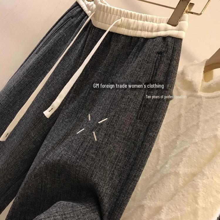 Женские фактурные брюки широкого покроя: Стильная вышивка и узор «елочка» для осени/зимы