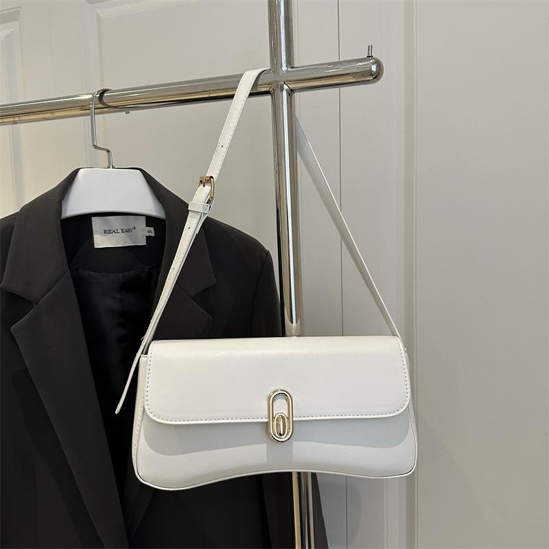 Ручная сумка-багет женская маленькая квадратная сумка французская индивидуальность трендовая 2025 новая замок модная ретро подмышечная зарубежный стиль на одно плечо