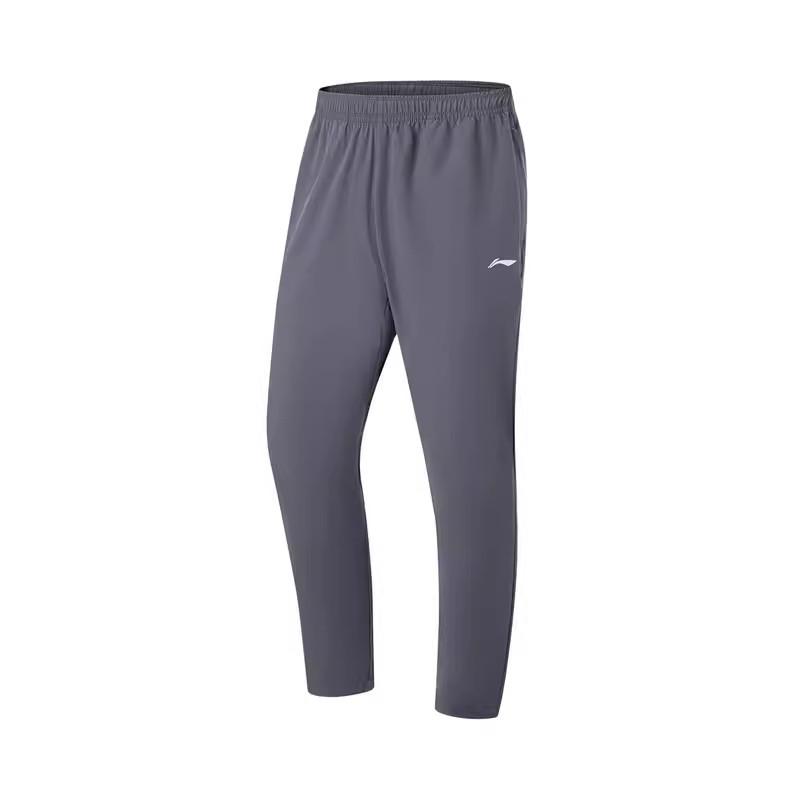 Li Ning Fitness Series Solid Color Mid Waist Comfortable Versatile Breathable Tapered Knit Sports Pants Men Pants Earth-Gray YYKU193-1