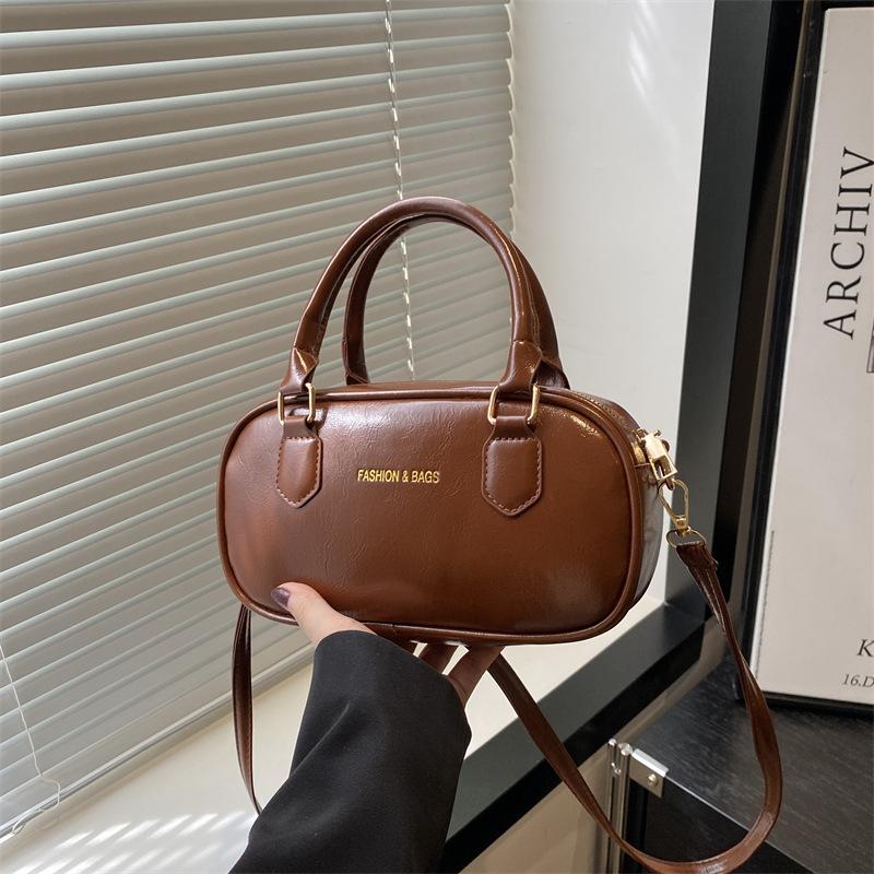 Модная сумка-тоут для ручной носки 2025 весна и лето новая простая повседневная наплечная сумка высококлассный тренд сумка через плечо