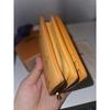 Used Louis Vuitton bi-fold wallet orange