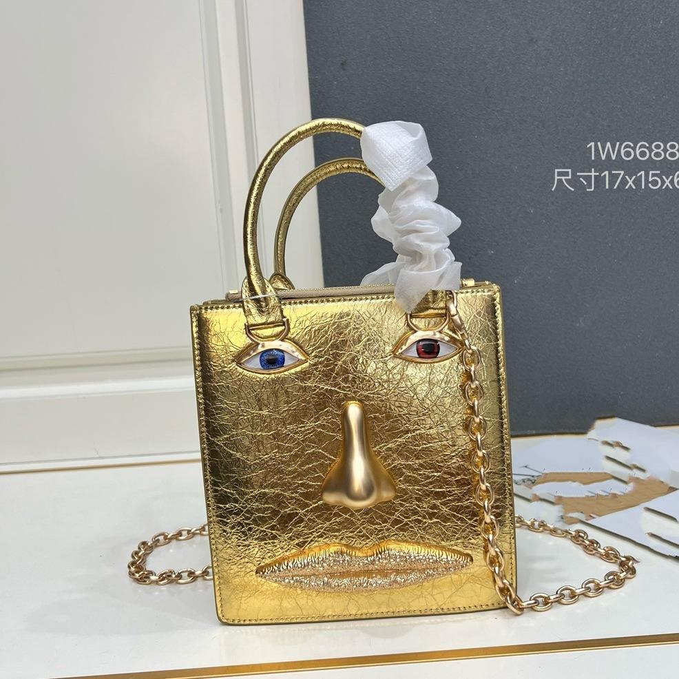 26 trendy new schiap face women's bag plain weave cowhide chain design sense hand-held tote bag