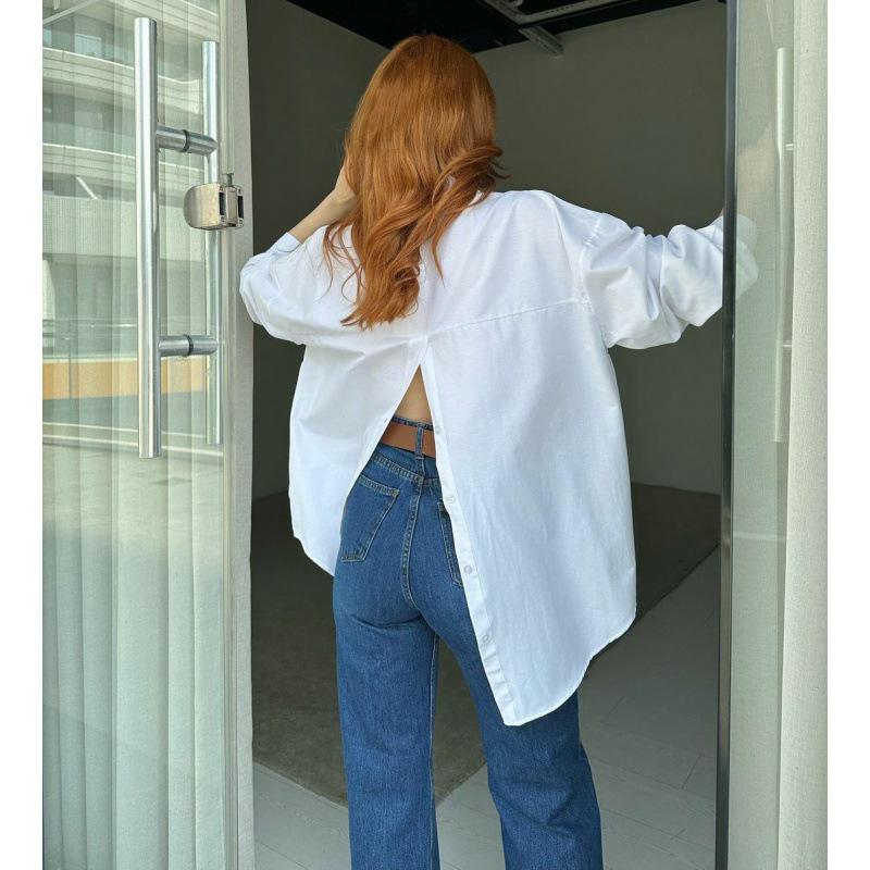 Европейская и американская женская однотонная рубашка с длинным рукавом и разрезом сзади свободного кроя - Мода осени 2023.