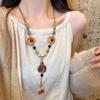 Vintage Bohemian Style Ceramic Beads, Long Braided Rope, Pendant, Necklace, Female Niche Design, Light Luxury and High-end Necklace.