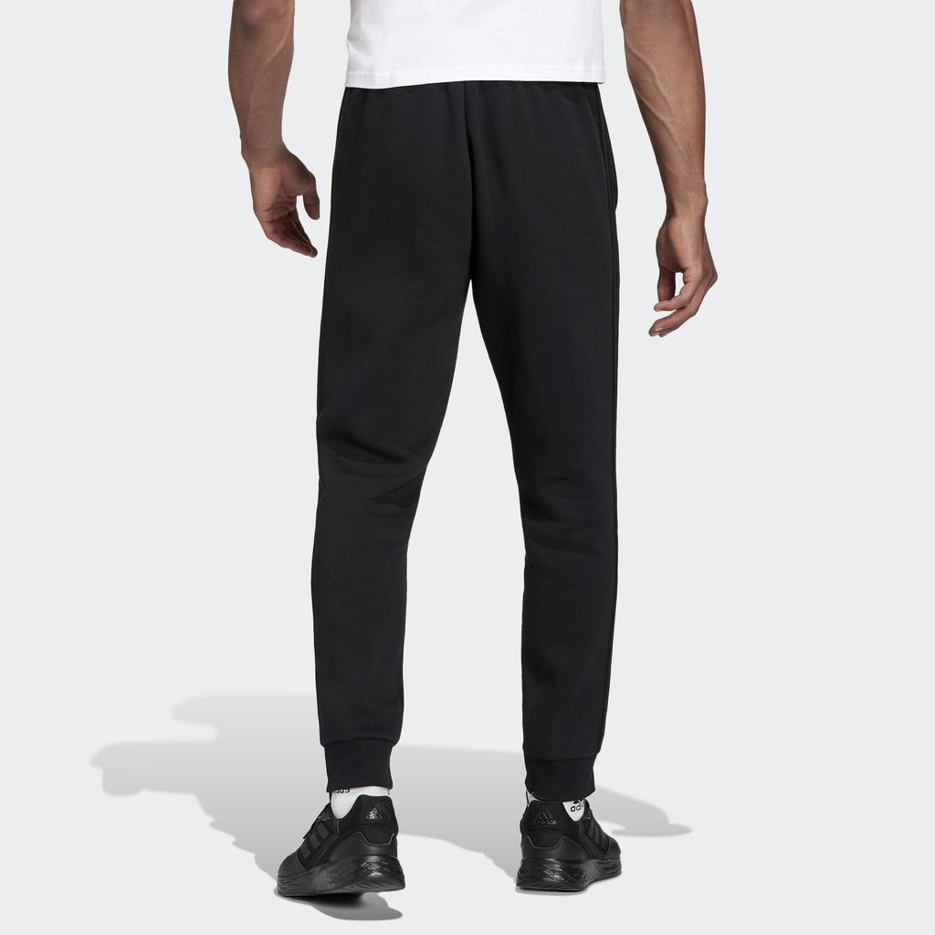 adidas Брюки Essentials French Terry зауженные с манжетами и тремя полосками H57046