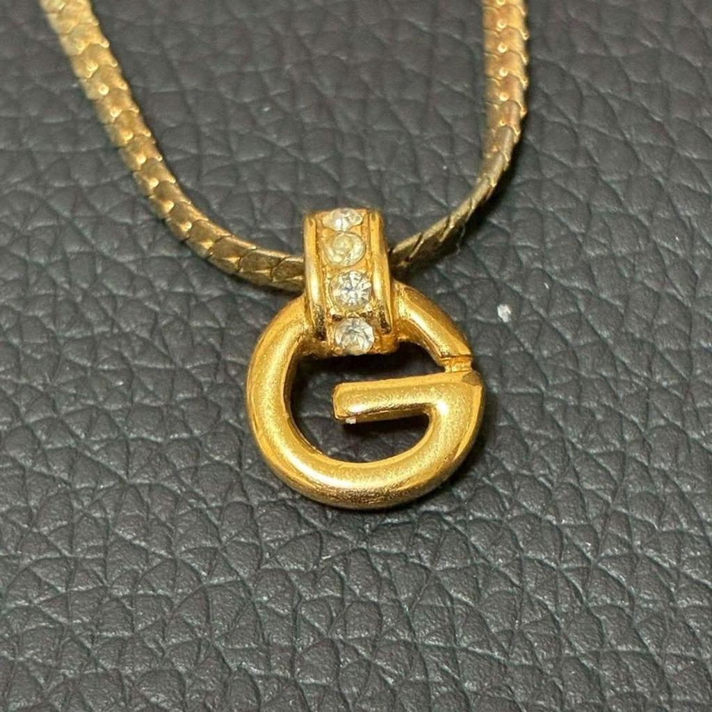 Б/у ожерелье GIVENCHY Кихей g логотип стразы золото