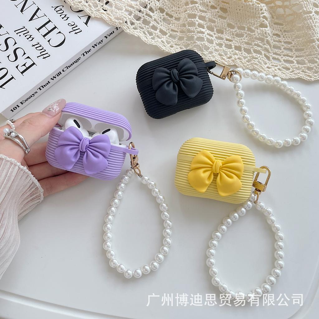 New Apple earphone case horizontal strip silicone bow + hand bead rope AirPods girl bow earphone cover