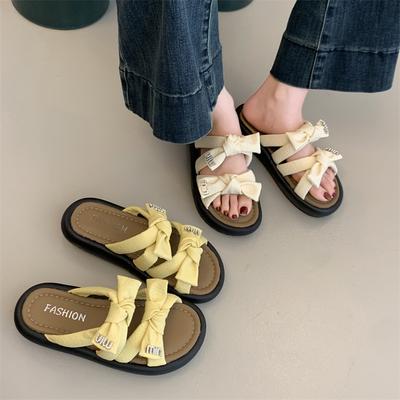 Толстая подошва верхняя одежда бант ощущение морской пляж интернет-знаменитость крутые шлепанцы женщины наступают на дерьмо ощущение мода фея новый