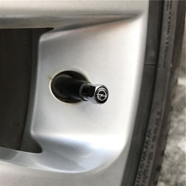 AAGX1 4Pcs Car Styling Metal Tire Valve Stem Caps Rim Accessories For Opel Astra Insignia Mokka Zafira Corsa Vectra C Car Wheel Hubcap