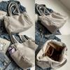 A Casual Corduroy Handbag with Zip Closure, Lightweight and Large Capacity, Fixed Shoulder Strap and Polyester Lining, Solid Everyday Commuter Handbag