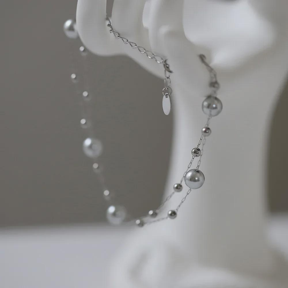 Браслет Interstellar Gray Whale Rain: Серебристо-серая жемчужная бусина ручной работы из титановой стали.