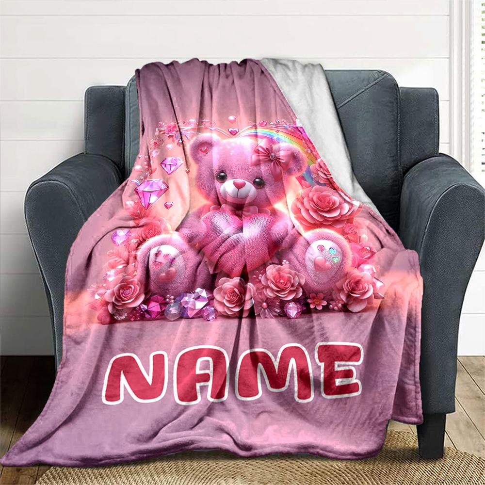A Pink Teddy Bear Holding A Heart Surrounded By Flowers And Gems With The Word Below Cozy Customizable Blanket Customize Text Soft Cozy Perfect For