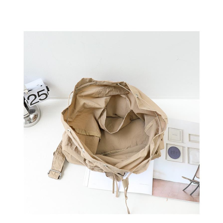 IELGY Korean Version of Casual Literary Canvas Backpack, Fashionable Nylon Solid Color Small Fresh Drawstring Backpack