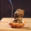Green Sandalwood Monkey King Incense Holder with Base - Creative Zen Tea Pet Ornament for Desktop and Office.
