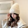 2024 осенние и зимние шапки женские плюшевые новые вязаные шапки универсальные теплые защитные наушники утолщенные модные шерстяные шапки