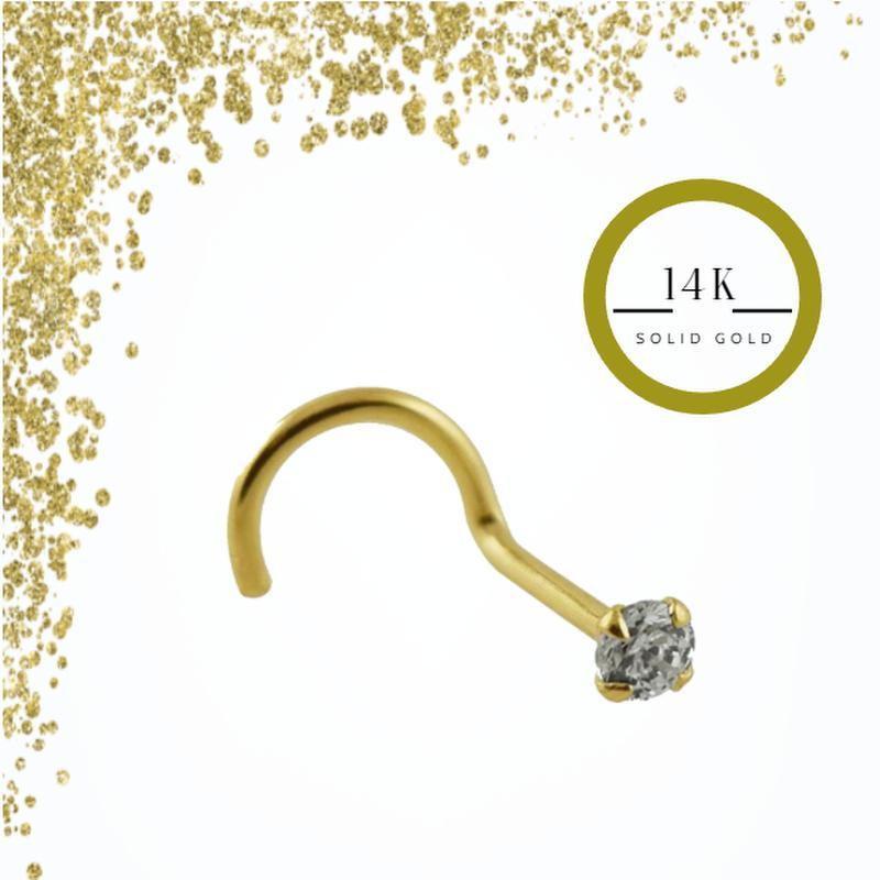 КОДИ ПИРСИНГ Пирсинг в носу из цельного золота 14 карат, украшенный круглым фианитом диаметром 2,5 мм и брошью с 4 зубцами.