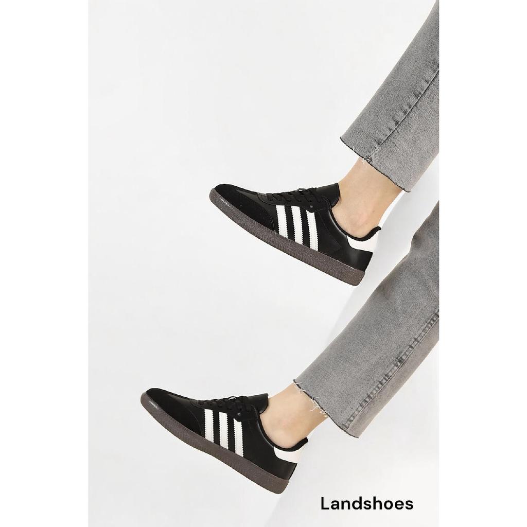 Бело-черные спортивные туфли унисекс в полоску на плоской подошве со шнуровкой