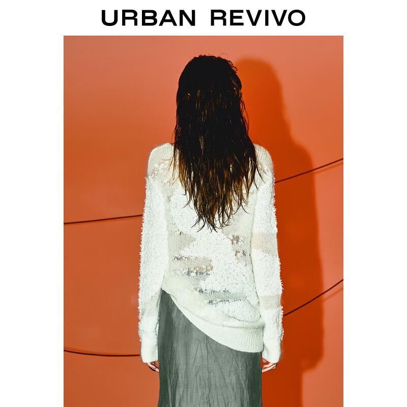 Женский вязаный свитер с ажурным узором