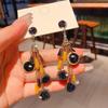 High Sense Niche Retro Light Luxury Fringed Earrings 2025 New Versatile Internet Celebrity Temperament Earrings