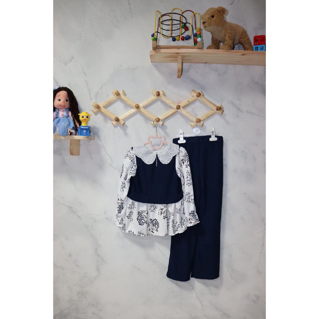 Стильный комплект для девочек - блузка с цветочным узором и современные брюки