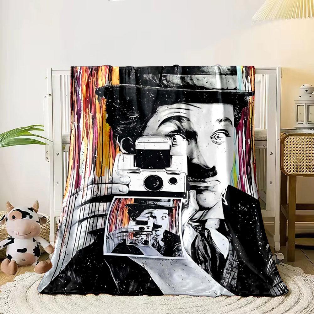 A recursive pattern of a person holding a camera displaying itself. for all seasons blanket lunch break throw gift