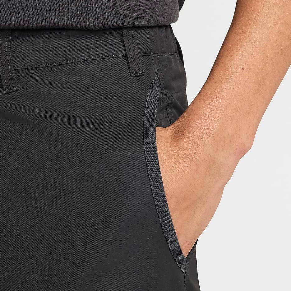 Nike Технологичные тканые брюки свободного кроя с прямыми штанинами, модные, универсальные, водонепроницаемые, повседневные, мужские, черные FZ0711060