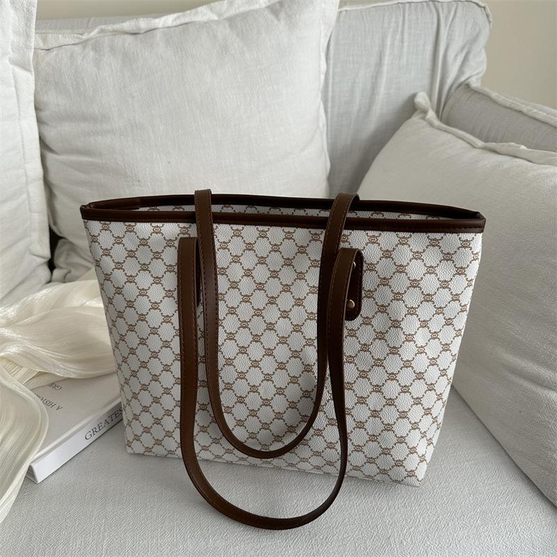 Сумка женская личность новая трендовая нишевый дизайн простая ручная на плечо сумка большой вместимости сумка-тоут