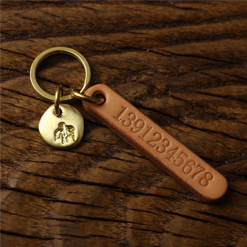 Ретро брелок для ключей автомобиля из гравированной коровьей кожи с индивидуальной биркой для номера телефона