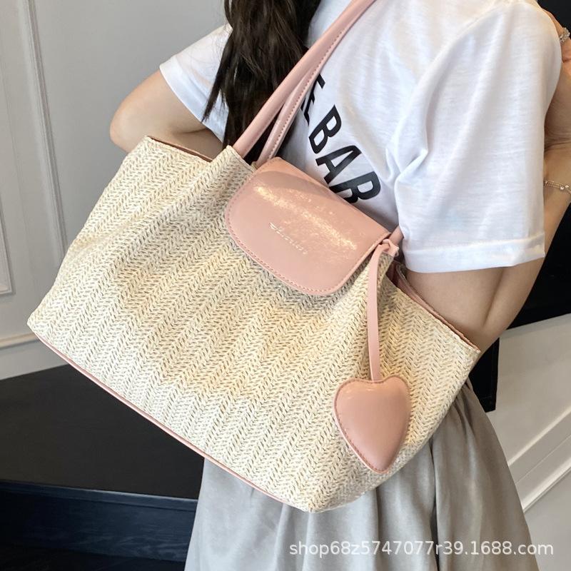 Straw bag women's 2025 new seaside woven handbag niche crossbody bag versatile tote bag is popular this year