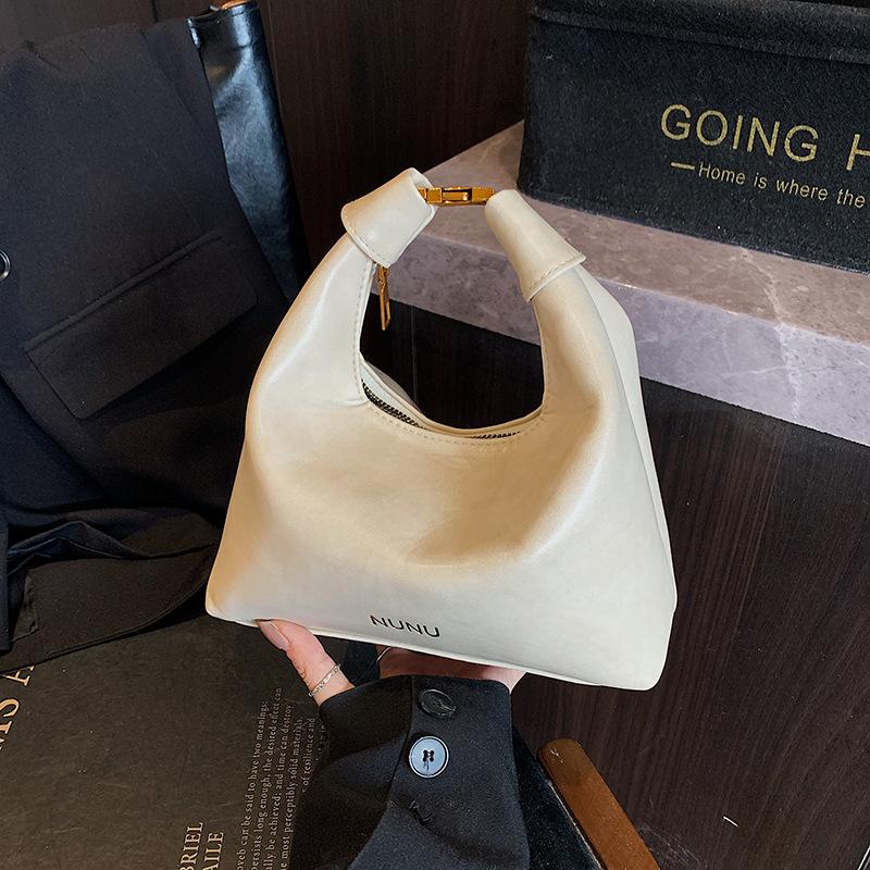 Французская нишевая сумка женская лето 2025 новая модная на плечо сумка-мессенджер высококлассный зарубежный стиль портативная сумка-пельмень