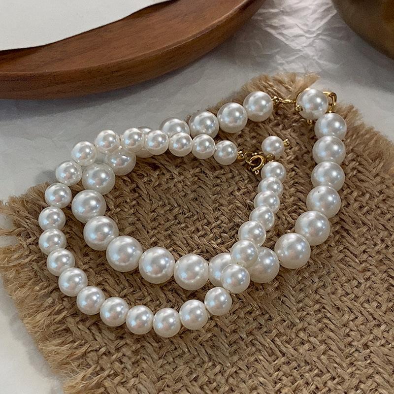 Искусственный жемчуг круглый прочный легкий браслет женский французский маленький аромат Хепберн стиль ювелирные изделия барокко ретро эластичные веревочные бусины
