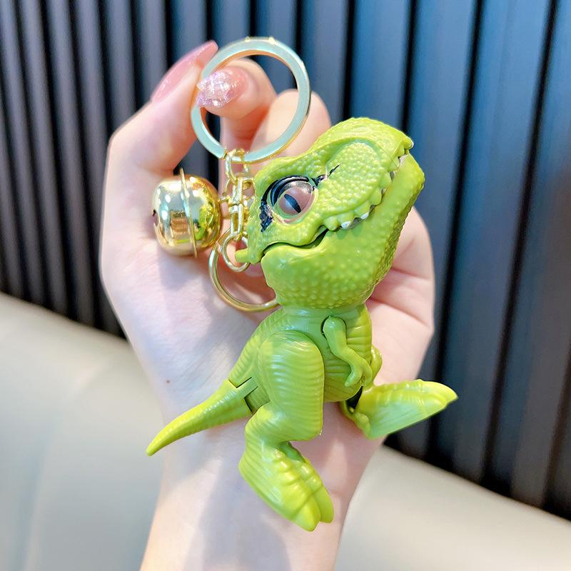 Креативный брелок в виде динозавра: Модная подвеска-игрушка в виде тираннозавра для укусов рукой для сумок, пар и подарков.