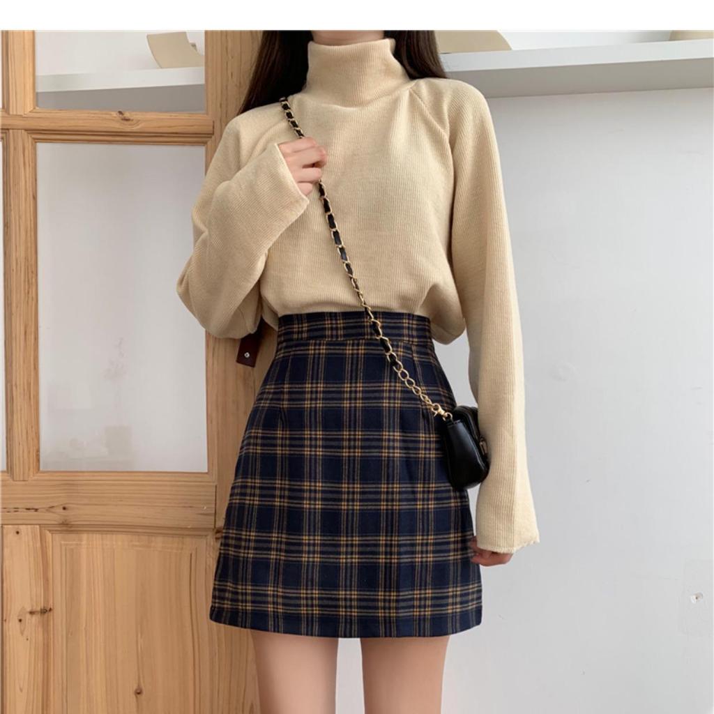 Юбка А-силуэта с высокой талией в клетку для женщин — тренд осени/зимы 2023 года