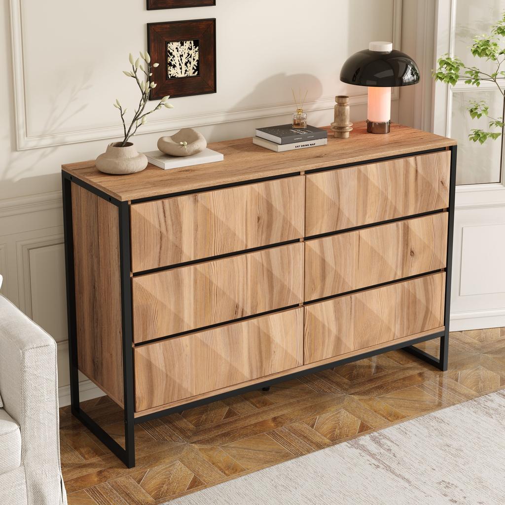 The sideboard and the chest of drawers are characterized by a combination of black and natural wood tones, metal legs and raised doors.