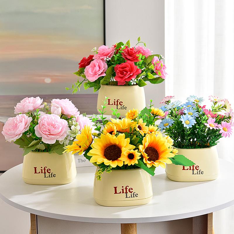 Living Room Decor: Artificial Sunflower and Green Plant Arrangements, Small Potted Plants, and Plastic Bouquets